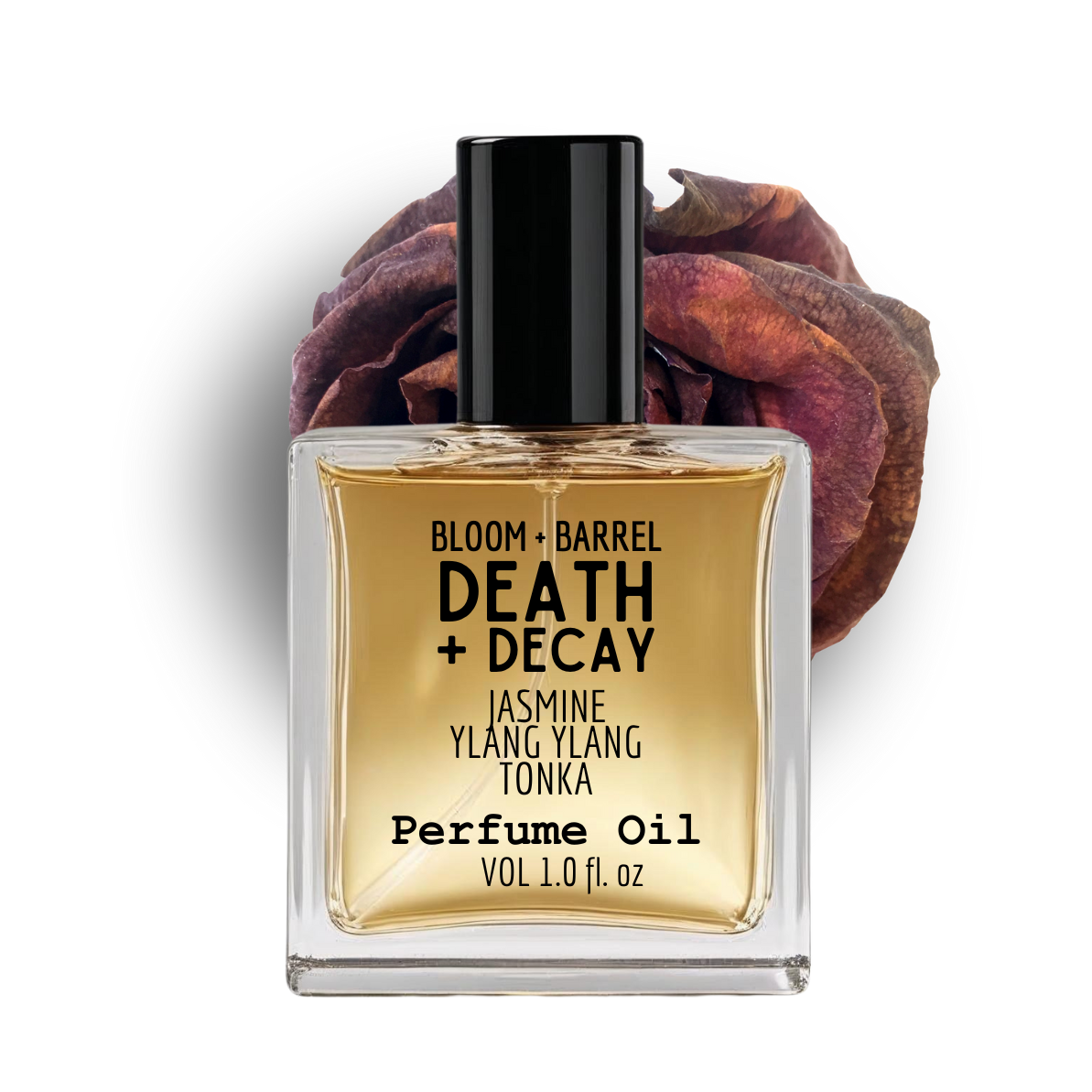 Perfume oil bottle labeled 'Death + Decay' with a dried rose on a white background