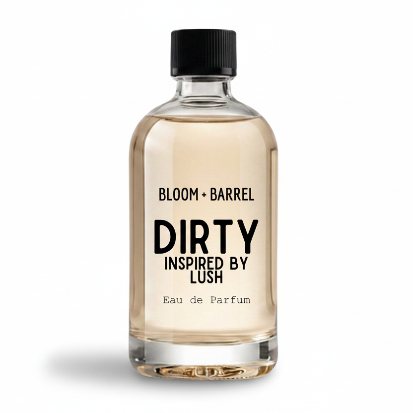 A clear glass bottle of Bloom Barrel Dirty Inspired by Lush Eau de Parfum with a black cap, containing a light amber liquid, on a solid white background.