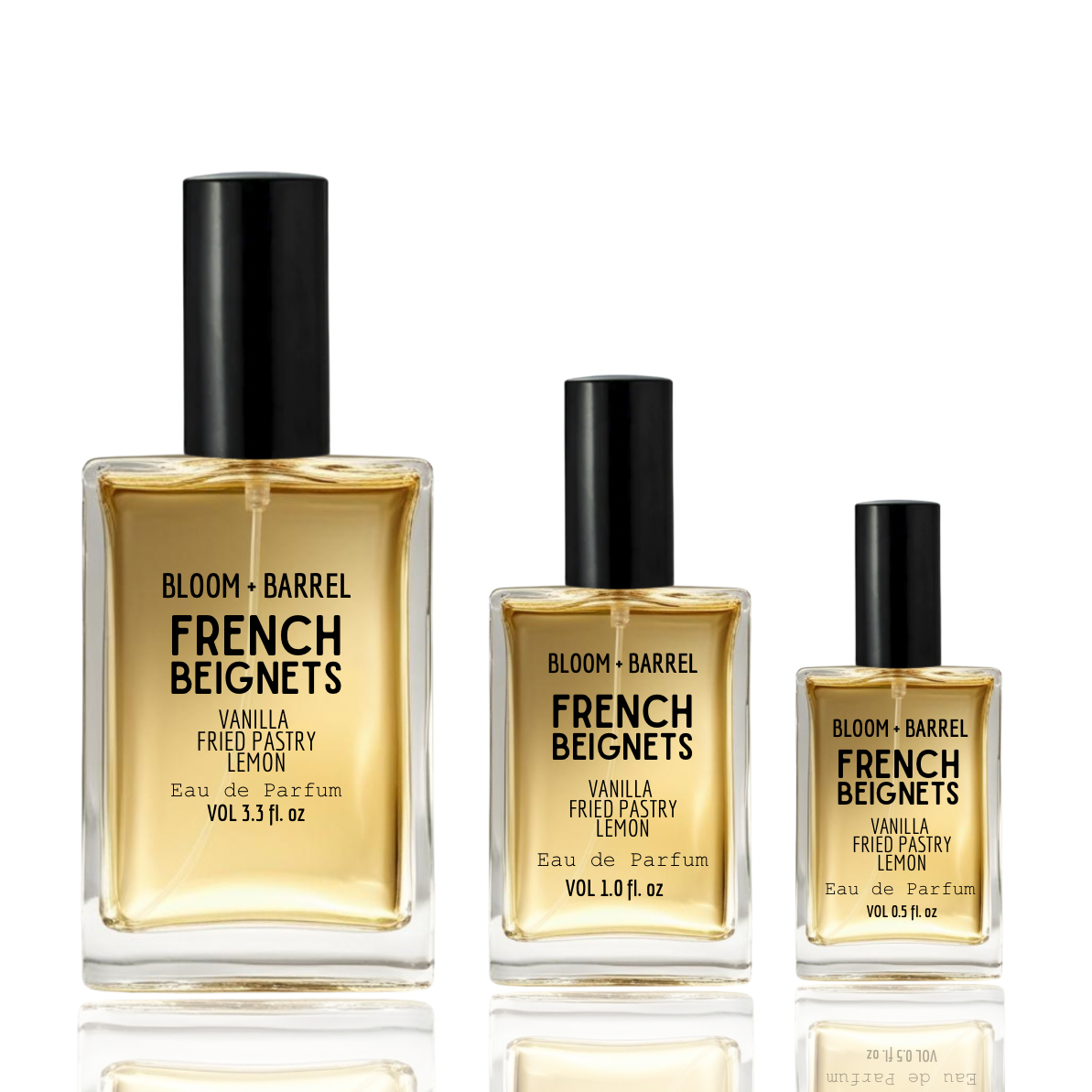 Three bottles of Bloom + Barrel French Beignets perfume on a white background