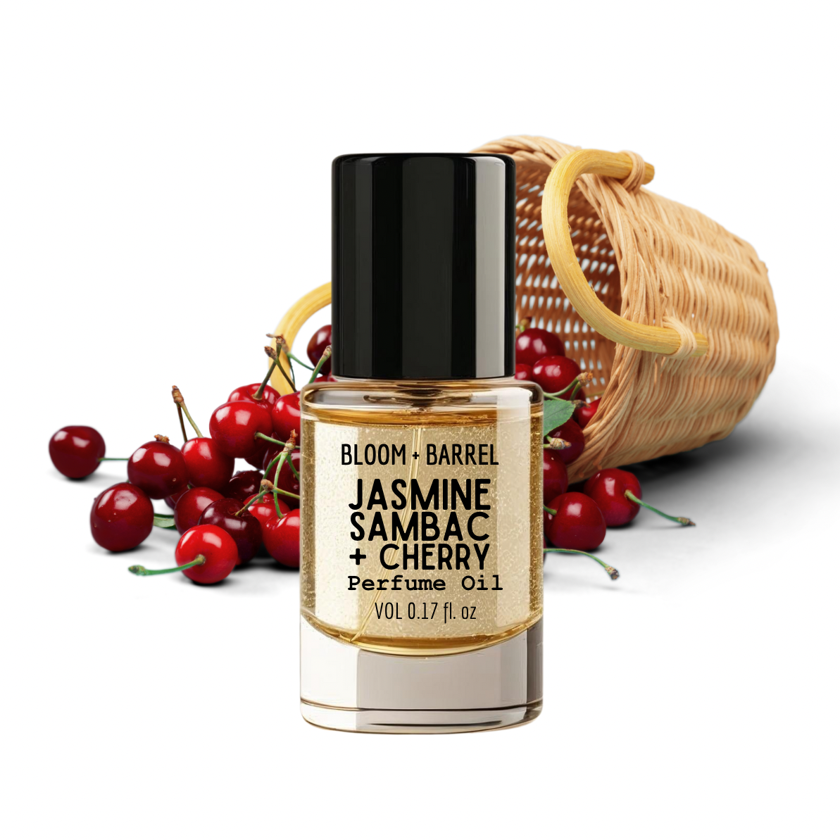 Bottle of Bloom & Barrel Jasmine Sambac + Cherry perfume oil with cherries and a basket on a white background