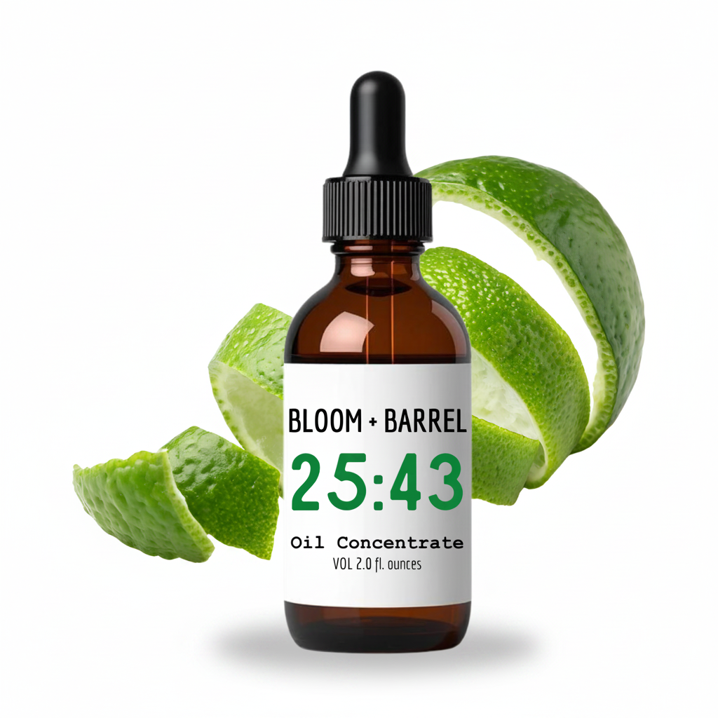 Bottle of Bloom + Barrel oil concentrate with green leaves on a white background