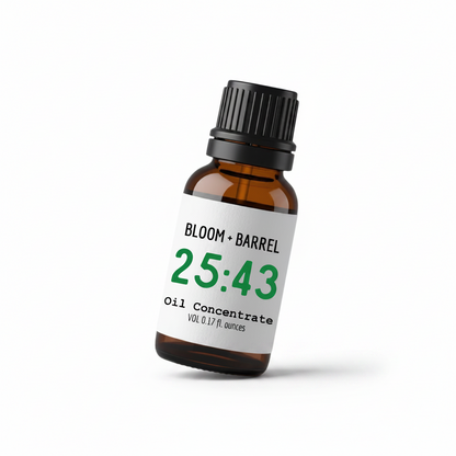 Bottle of Bloom & Barrel oil concentrate with a white label on a white background