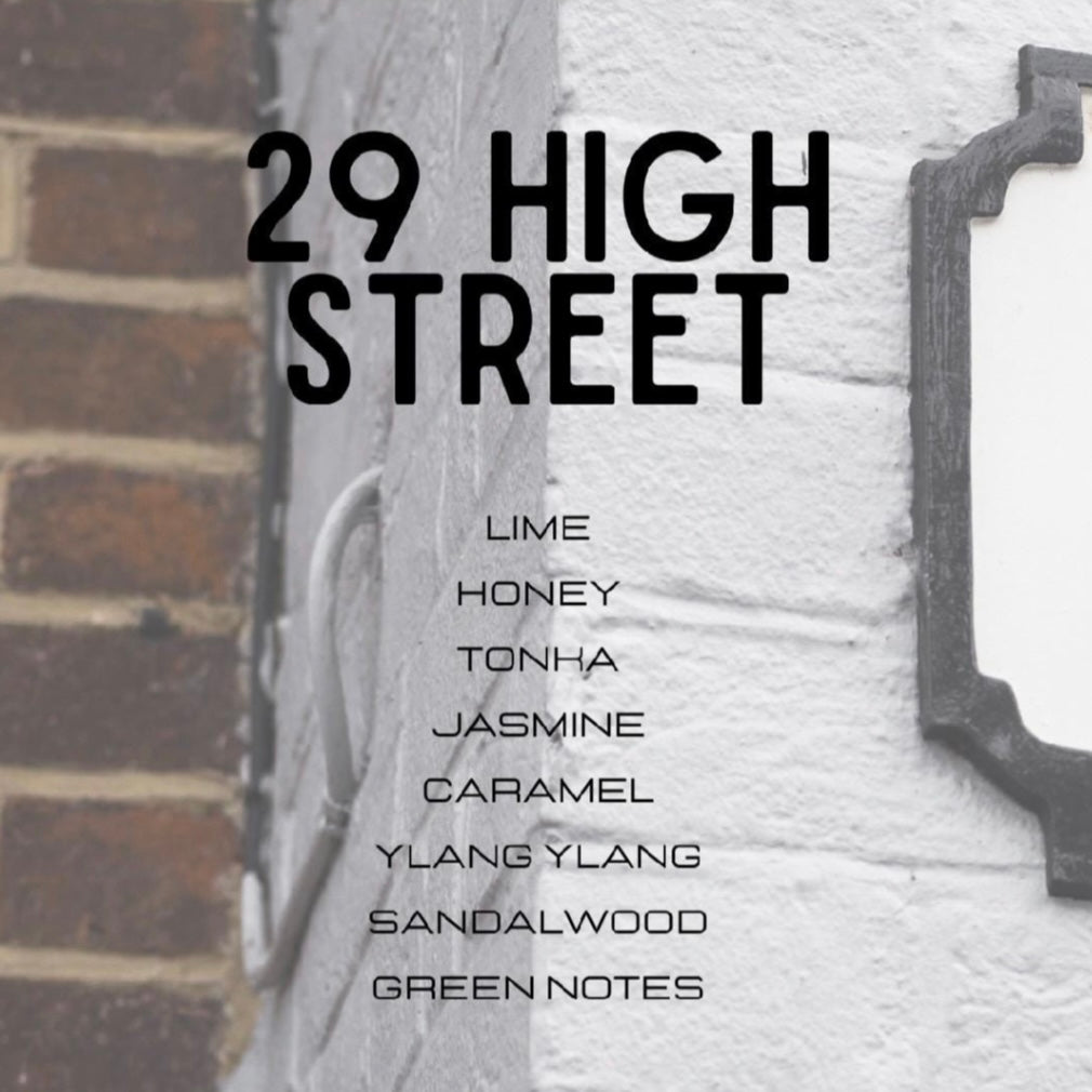 Text on a textured surface with '29 High Street' and fragrance notes listed.