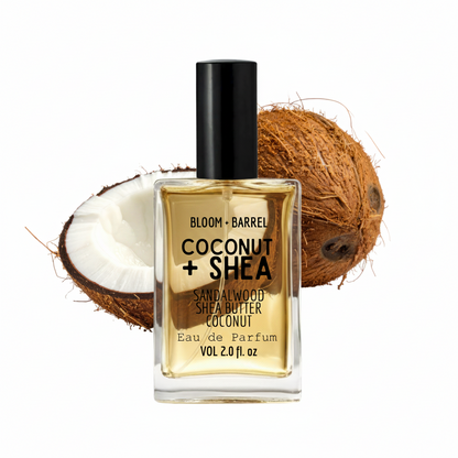 Bottle of Bloom + Barrel Coconut + Shea sandalwood shea butter coconut eau de parfum with a coconut in the background.