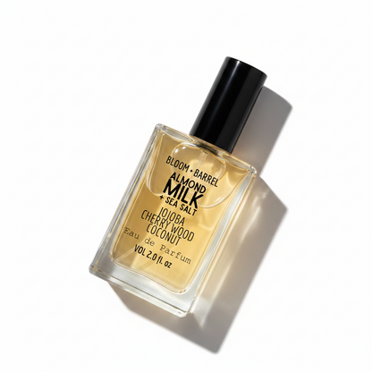 Perfume bottle labeled 'Bloom + Barrel' on a white background