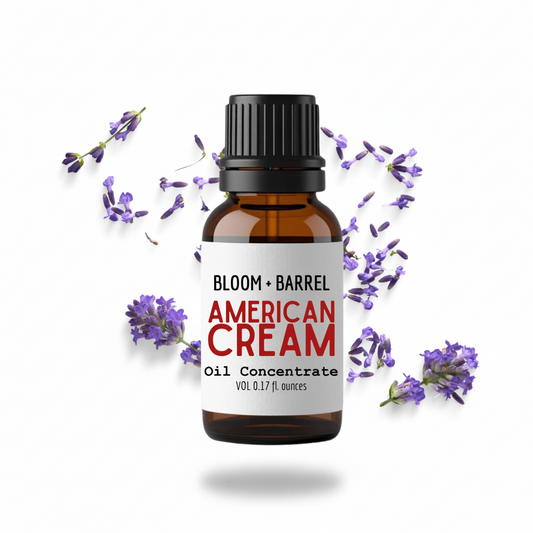 Bottle of Bloom & Barrel American Cream Oil Concentrate with lavender flowers on a white background