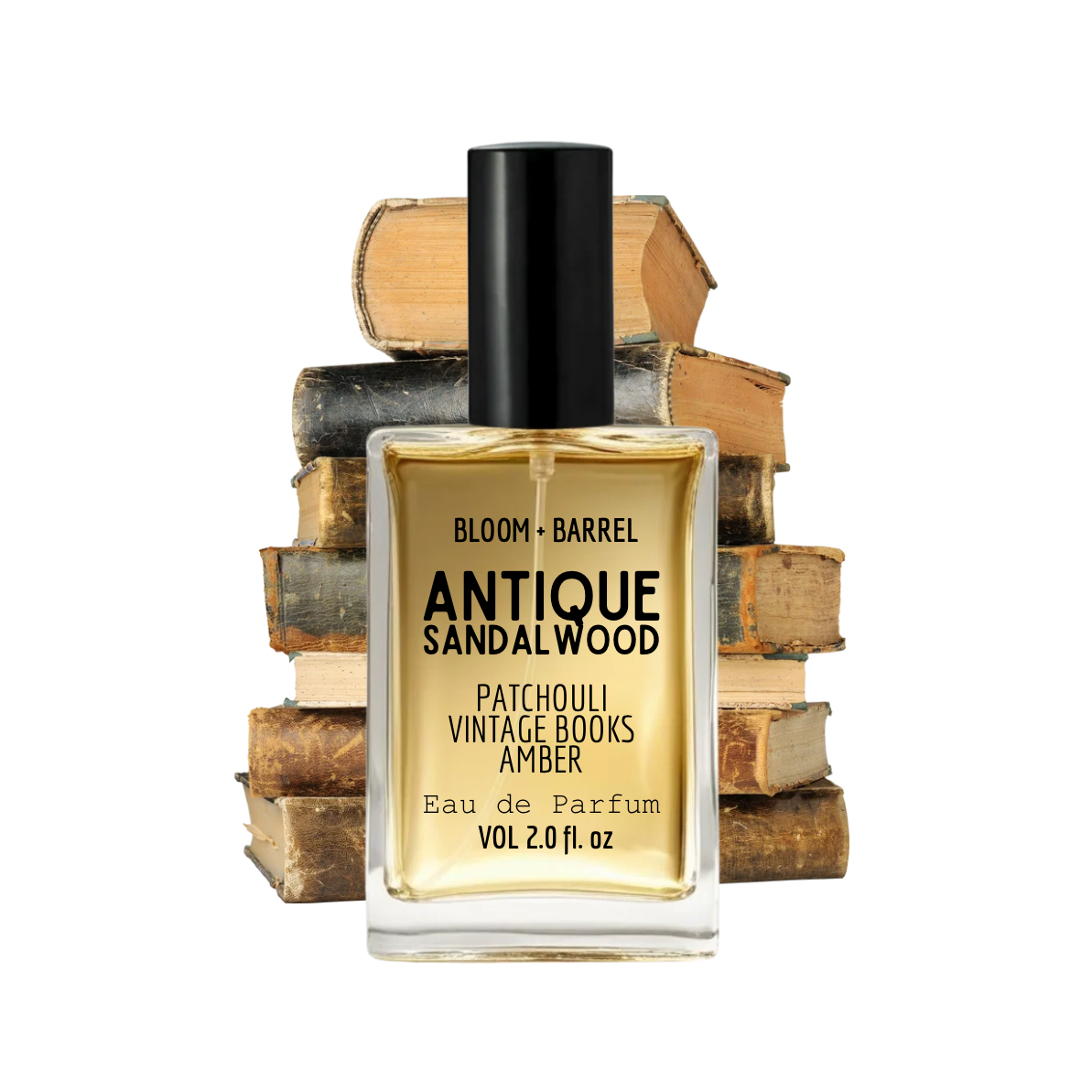 Perfume bottle labeled 'Antique Sandalwood' with vintage books in the background