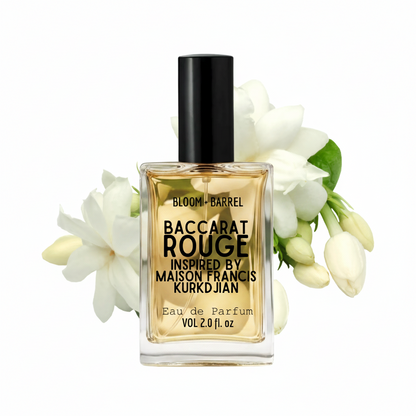 A bottle of Bloom + Barrel Baccarat Rouge Eau de Parfum, inspired by Maison Francis Kurkdjian, styled with white jasmine flowers on a clean white background.