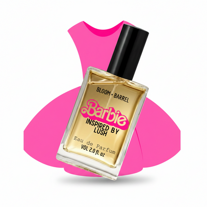 A bottle of Barbie Inspired by Lush Bloom + Barrel Eau de Parfum, featuring a clear glass bottle with golden-yellow liquid, a black cap, and a pink and yellow logo, set against a bright pink abstract background on a white backdrop.