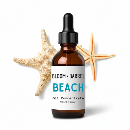 Bottle of Bloom + Barrel Beach Oil Concentrate with starfish on a white background