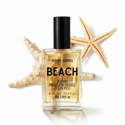 Perfume bottle labeled 'Beach' with starfish on a white background