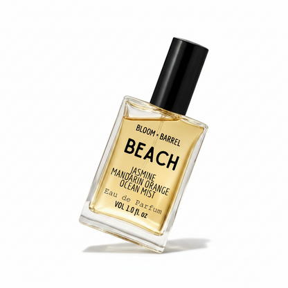 Perfume bottle labeled 'Beach' by Bloom & Barrel on a white background