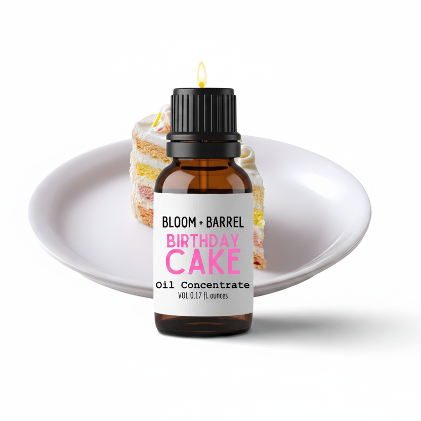 Bottle of Bloom & Barrel Birthday Cake oil concentrate with a slice of cake on a white plate.