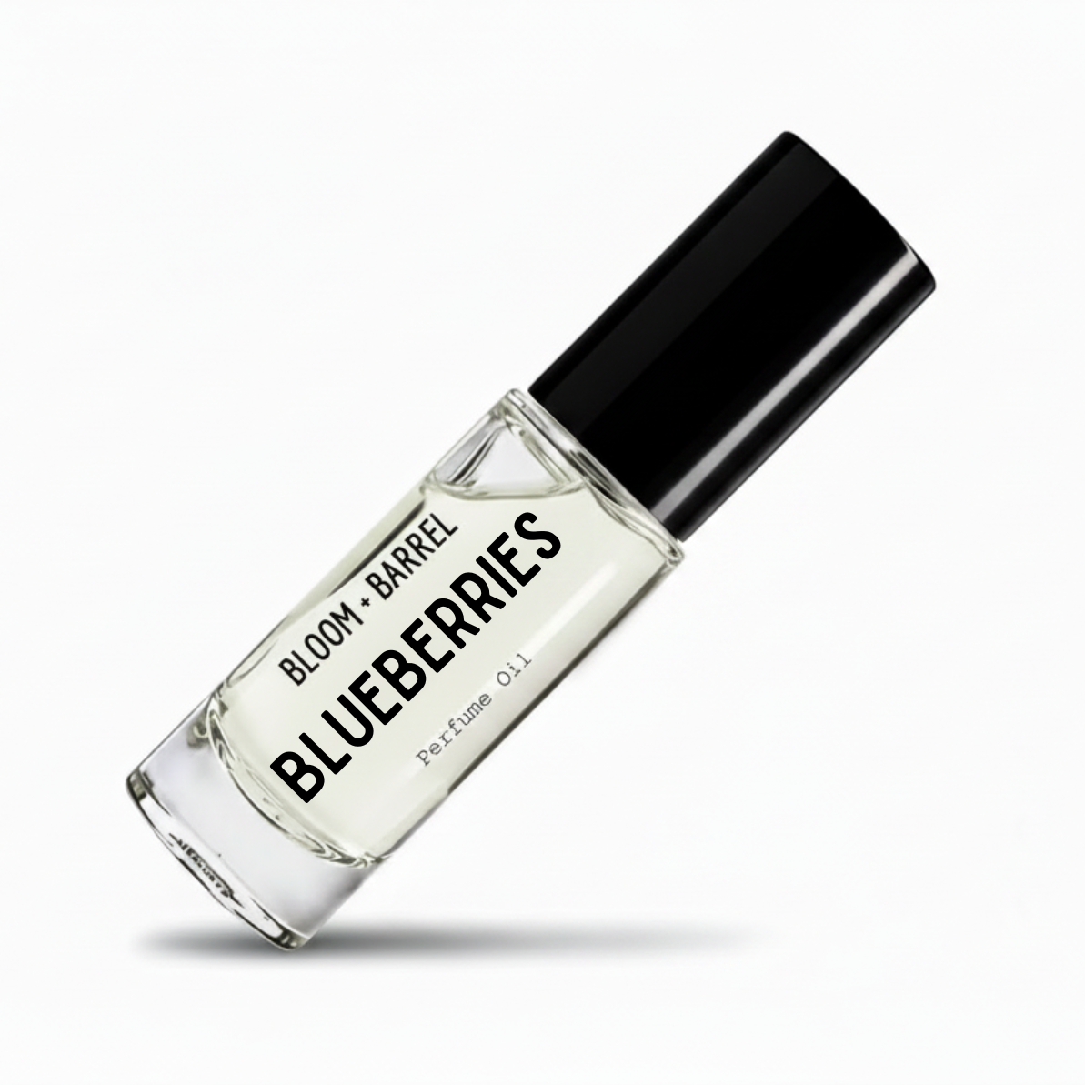 A clear glass perfume oil bottle with a black cap, labeled 'BLOOM • BARREL BLUEBERRIES Perfume Oil', shown on a clean white background with a soft shadow.