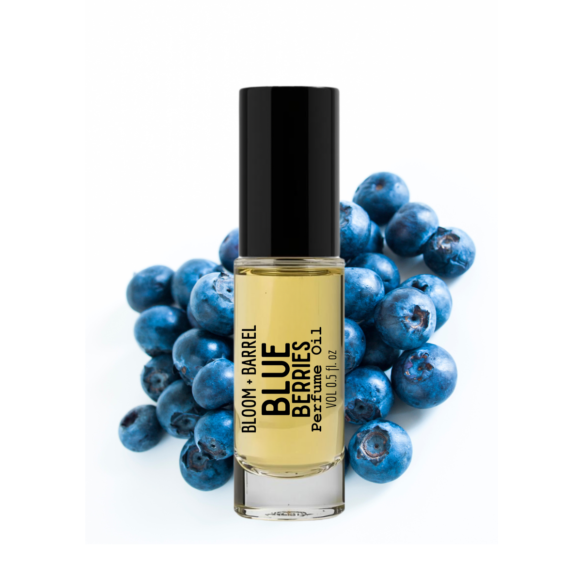 Perfume bottle labeled 'Blue Berries' surrounded by blueberries on a white background
