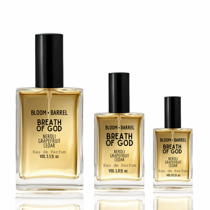 Three bottles of Bloom & Barrel Breath of God perfume on a white background