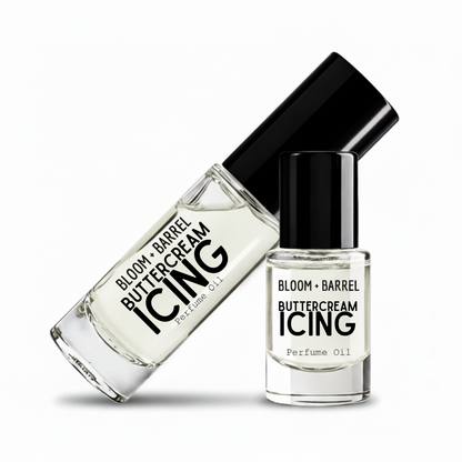 Two clear glass perfume oil bottles with black caps from BLOOM + BARREL, featuring the scent Princess Banana, on a clean white background.