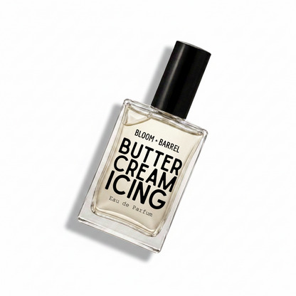 Bloom Barrel Butter Cream Icing Eau de Parfum in a clear rectangular glass bottle with a black cap, centered on a white background.