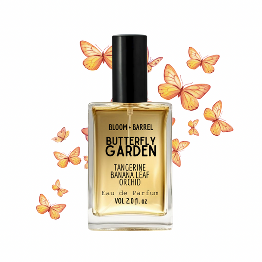 Perfume bottle labeled 'Butterfly Garden' with butterfly graphics on a white background