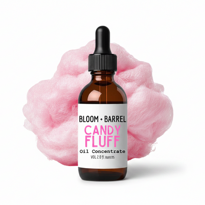 Bottle of Bloom + Barrel Candy Fluff oil concentrate with pink cotton candy on a white background