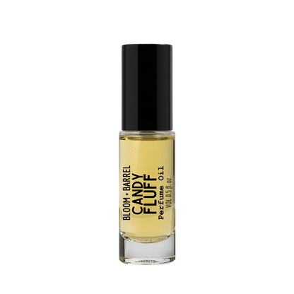 Perfume bottle labeled 'Bloom & Barrel Candy Fluff' on a white background