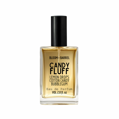 Perfume bottle labeled 'Candy Fluff' by Bloom & Barrel on a white background