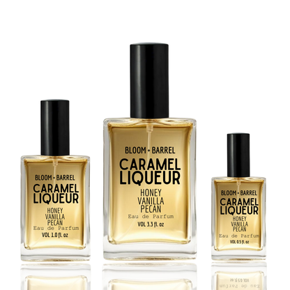 Three bottles of Bloom & Barrel Caramel Liqueur perfume on a white background