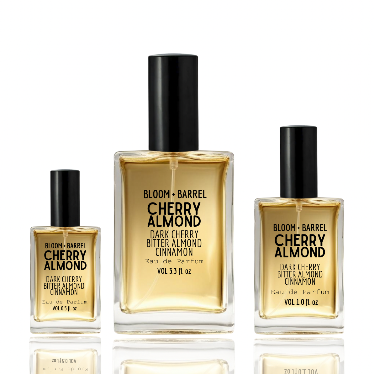 Three bottles of Bloom & Barrel Cherry Almond perfume on a white background