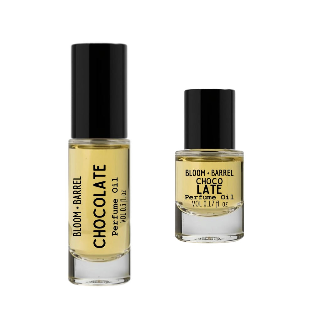 Two bottles of Bloom & Barrel perfume oils on a white background
