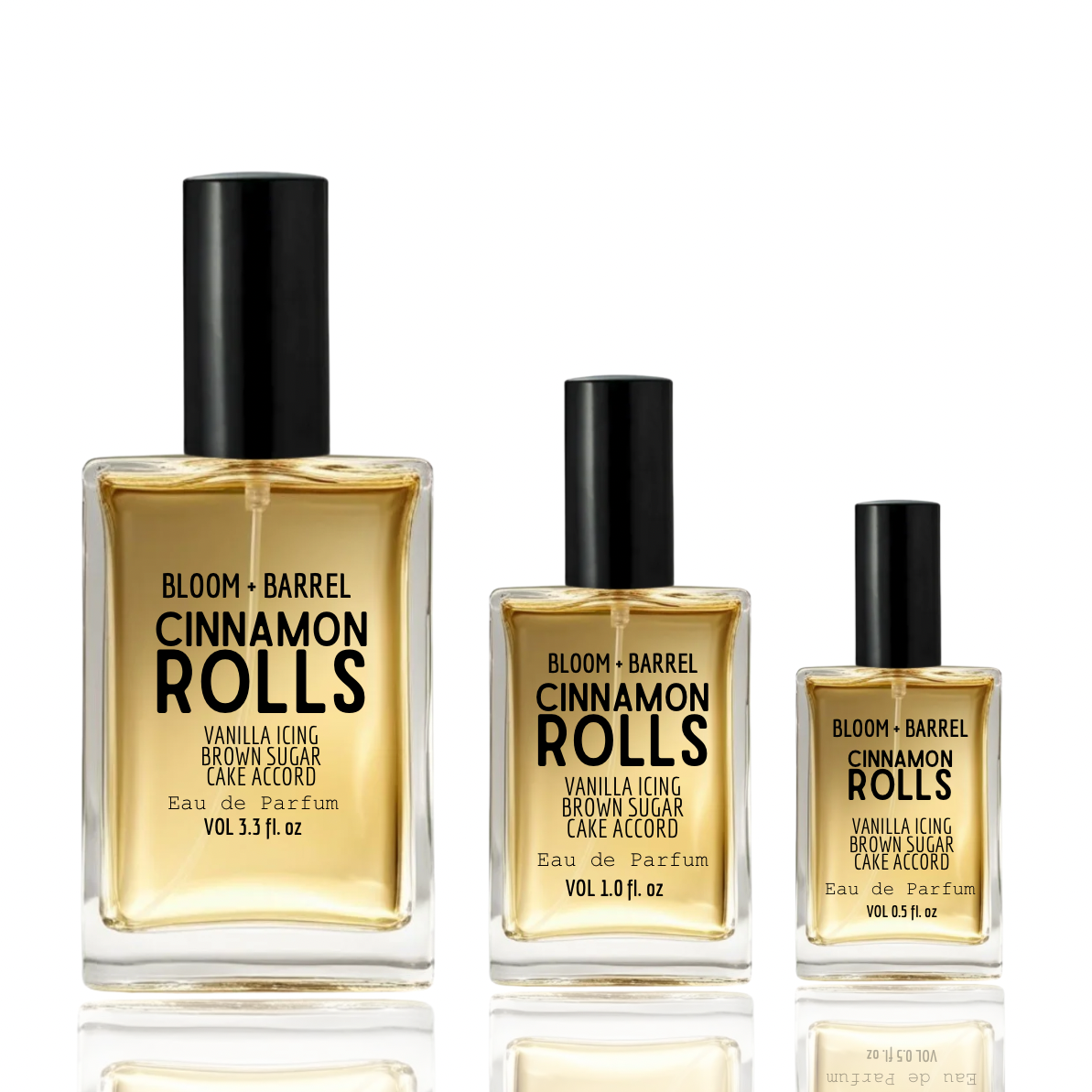 Three glass perfume bottles of BLOOM + BARREL Cinnamon Rolls Eau de Parfum in different volumes (3.7 fl.