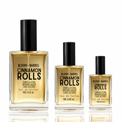 Three glass perfume bottles of BLOOM + BARREL Cinnamon Rolls Eau de Parfum in different volumes (3.7 fl.