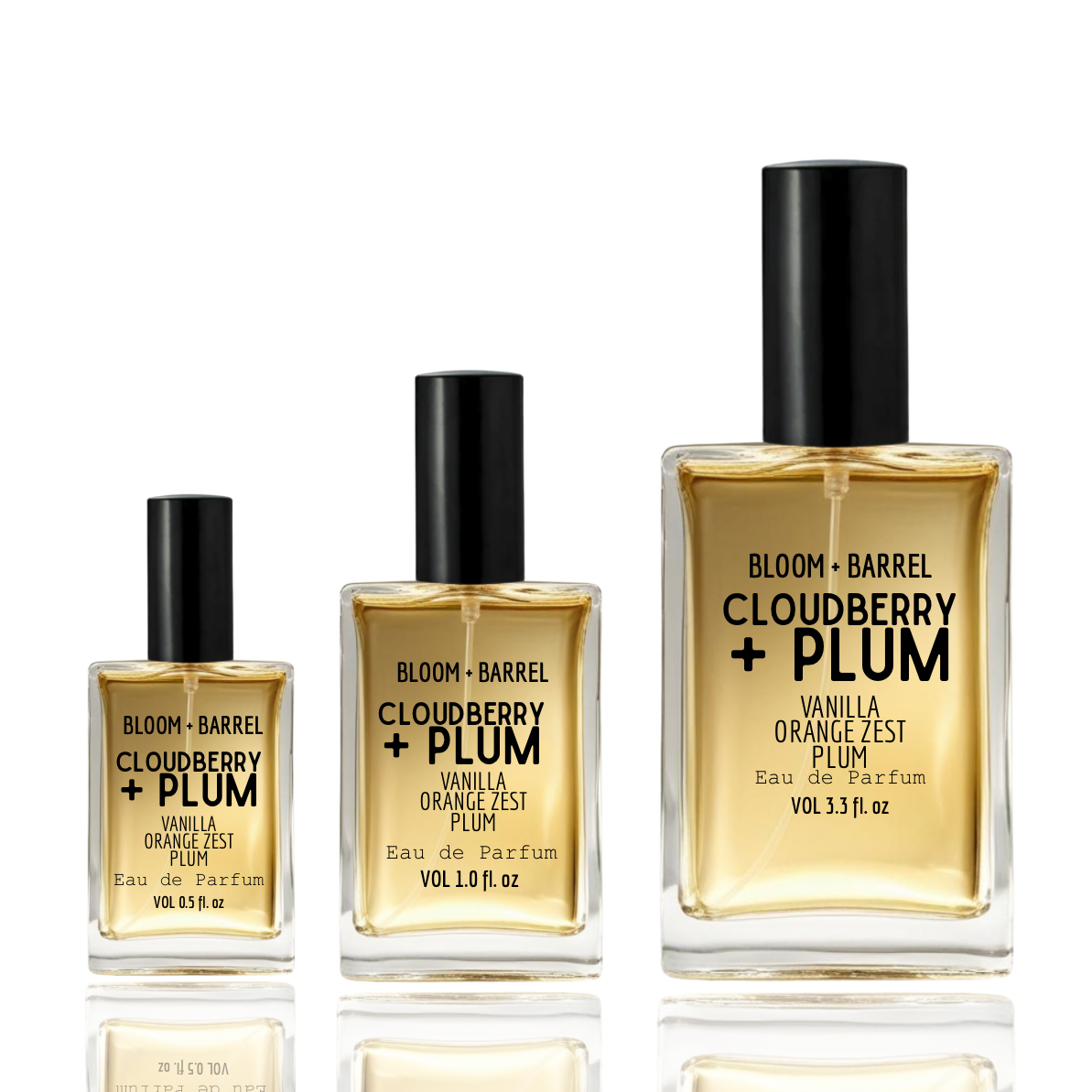 Three bottles of Bloom & Barrel Cloudberry + Plum perfume on a white background