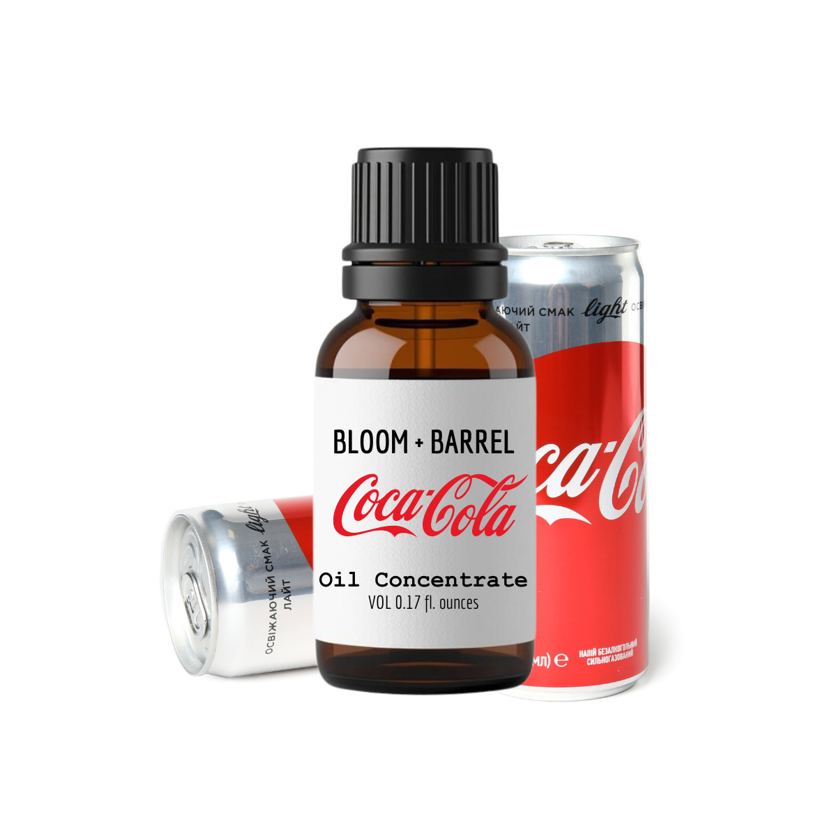 Bottle of Bloom & Barrel Coca-Cola oil concentrate with two cans on a white background