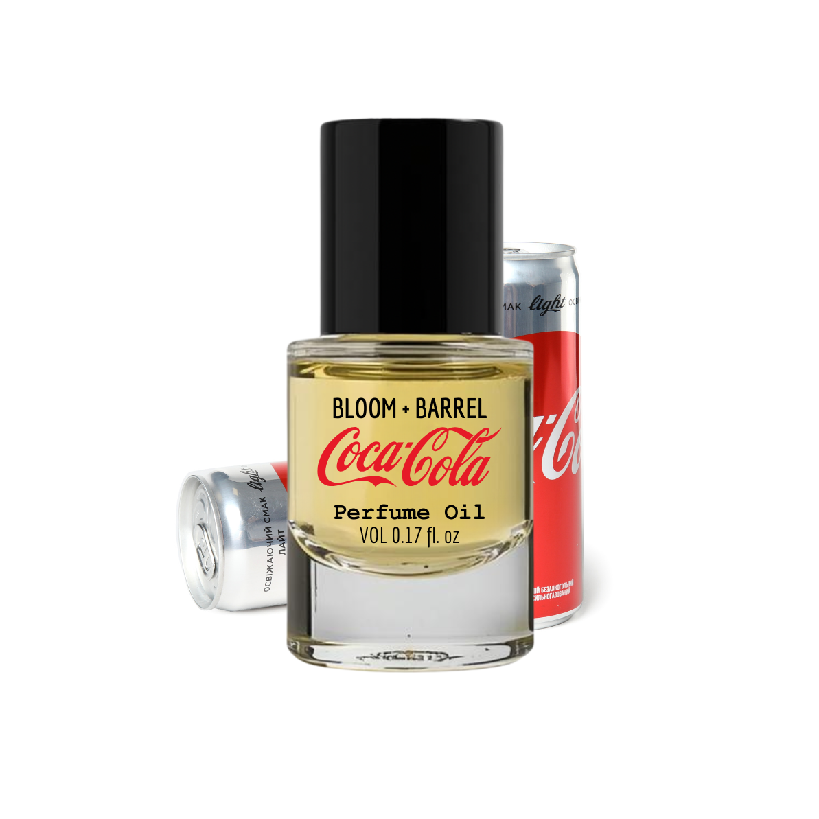 Coca-Cola perfume oil bottle with a can of Coca-Cola in the background on a white background