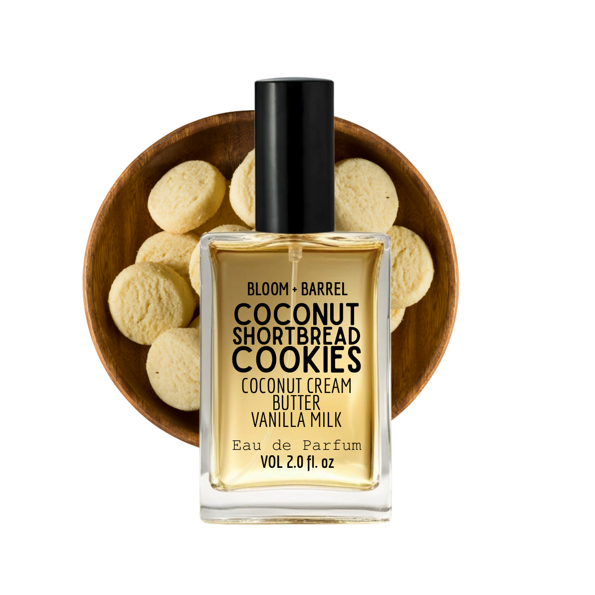Bottle of 'Coconut Shortbread Cookies' perfume with a wooden bowl of cookies on a white background