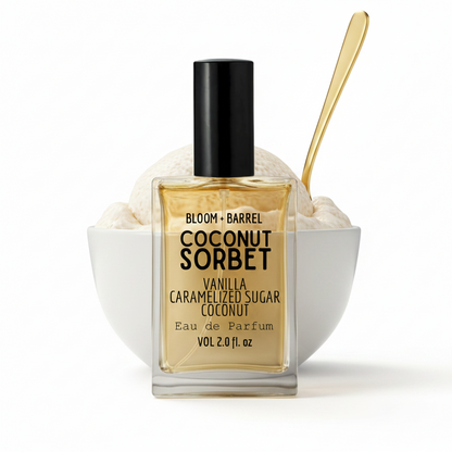 Bottle of Bloom & Barrel Coconut Sorbet perfume with a spoon and container on a white background