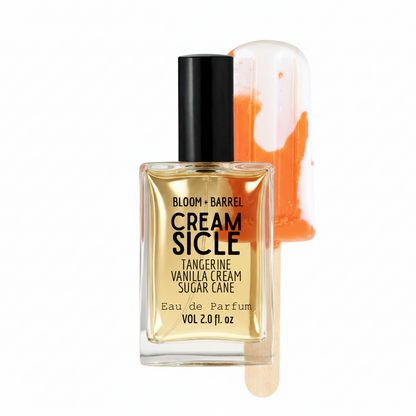 Bottle of Bloom & Barrel Cream Sicle eau de parfum with a popsicle-shaped container on a white background