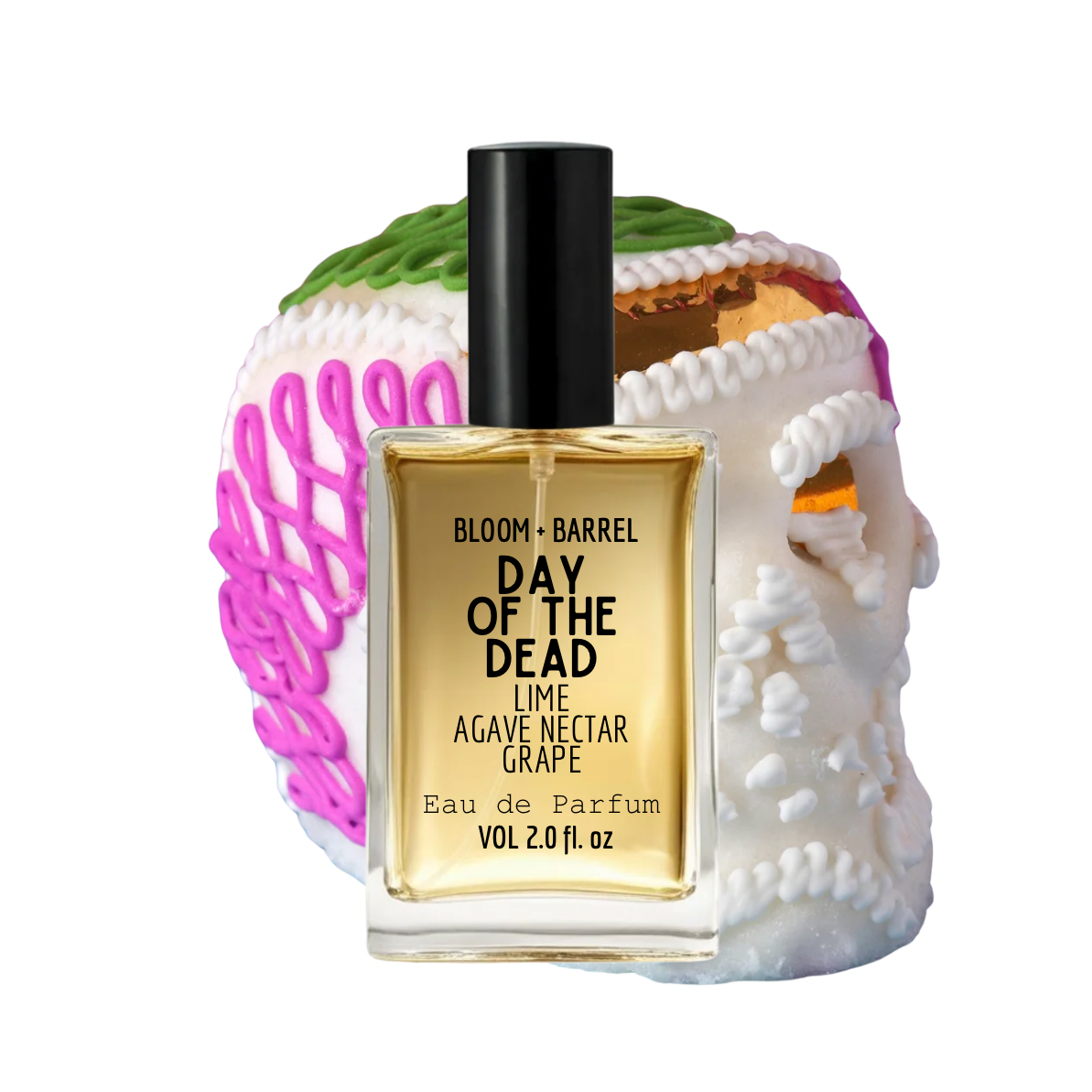Perfume bottle with decorative skull and floral elements on a white background
