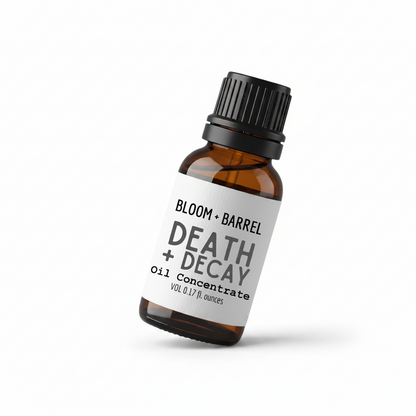 Bottle of Bloom + Barrel Death + Decay Oil Concentrate on a white background