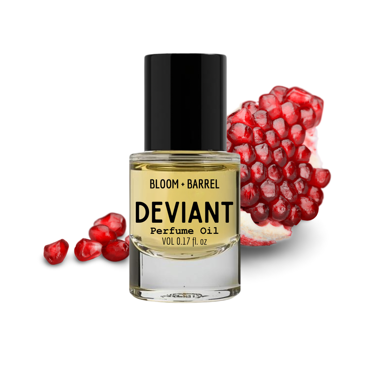 Bottle of Bloom & Barrel Deviant Perfume Oil with pomegranate fruits on a white background