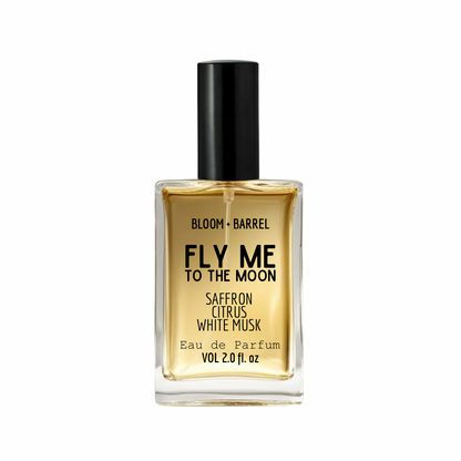 Perfume bottle labeled 'Fly Me to the Moon' by Bloom & Barrel on a white background