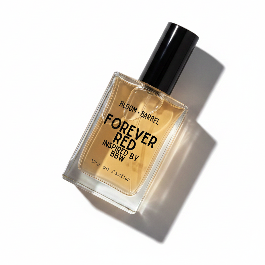 A rectangular glass bottle of Forever Red Eau de Parfum by BBW, filled with amber-colored liquid and featuring a black cap, centered on a plain white background.