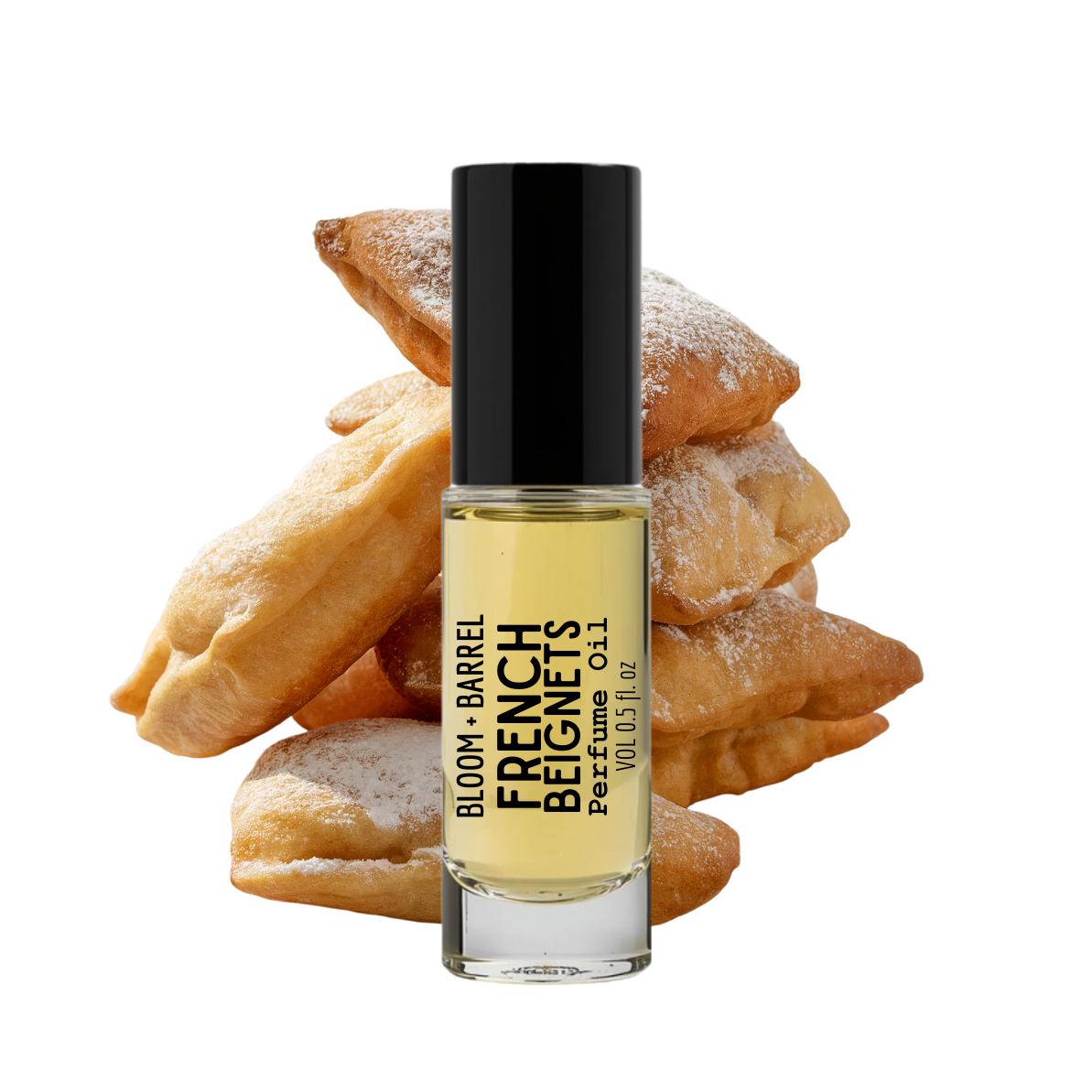 Perfume bottle labeled 'French Beignets' with beignets in the background