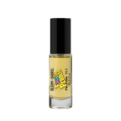 Small glass bottle with black cap and colorful label on a white background
