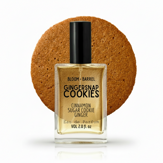 Perfume bottle labeled 'Gingersnap Cookies' with a gingersnap cookie on a white background