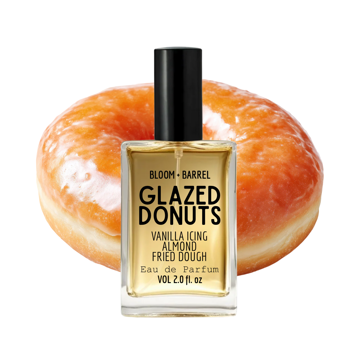 Bloom + Barrel Glazed Donuts Eau de Parfum bottle in front of a glazed donut on a white background.