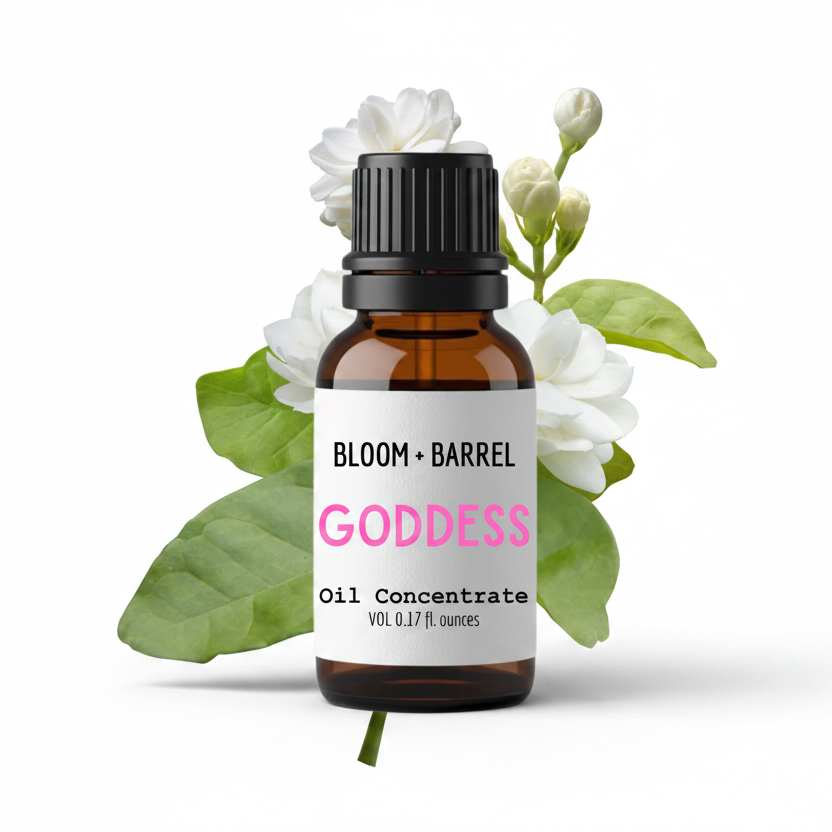 Bottle of 'Goddess' oil concentrate from Bloom & Barrel with flowers on a white background