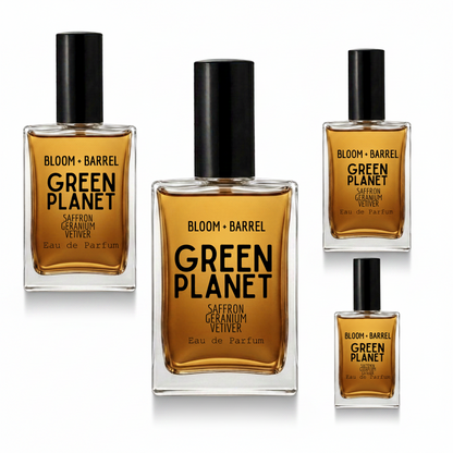 Four bottles of BLOOM + BARREL Green Planet Saffron Geranium Velvet Eau de Parfum in different sizes, arranged on a plain white background.