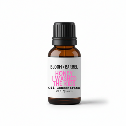 Bottle of Bloom & Barrel oil concentrate with a white label on a white background