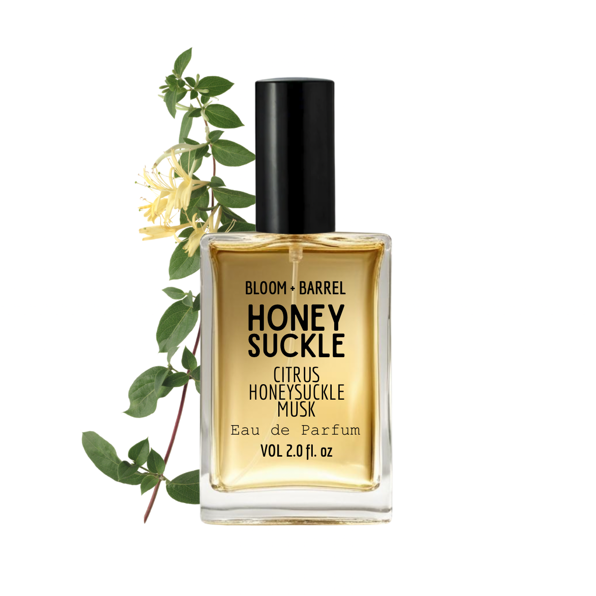 Perfume bottle labeled 'Honey Suckle' with a sprig of honeysuckle on a white background